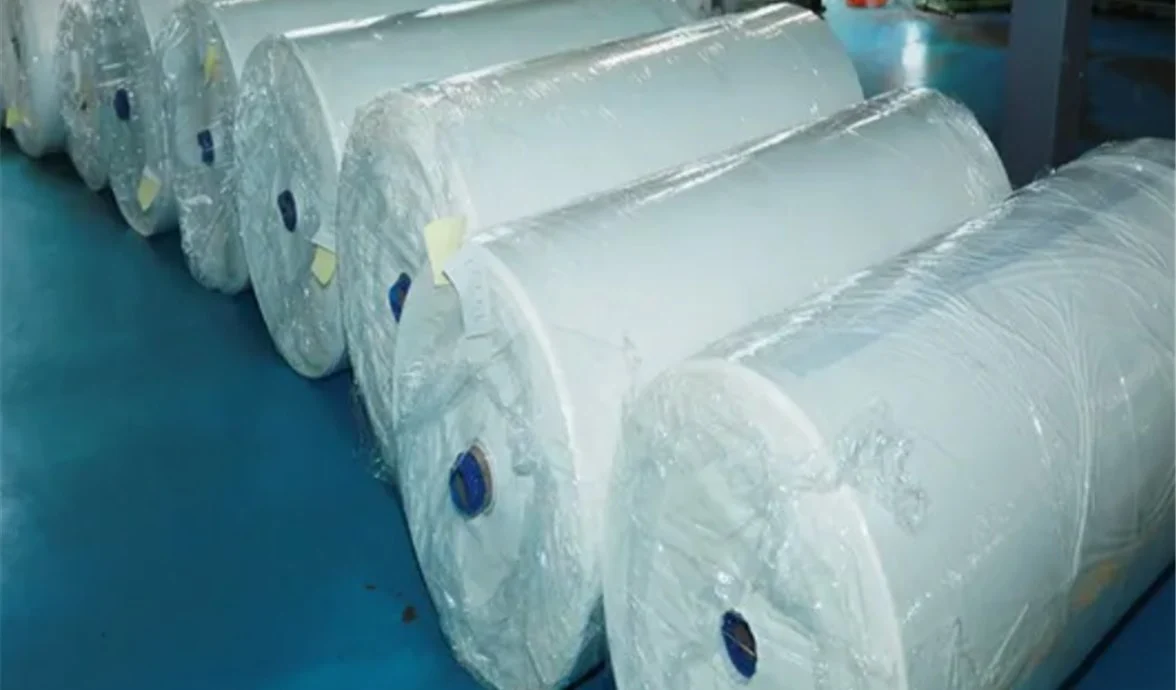 Greenlano technicians conducting precise dimension and print alignment checks on finished packaging batches