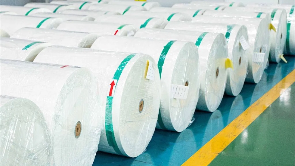 Pre-cut pan liner sheets stacked precisely