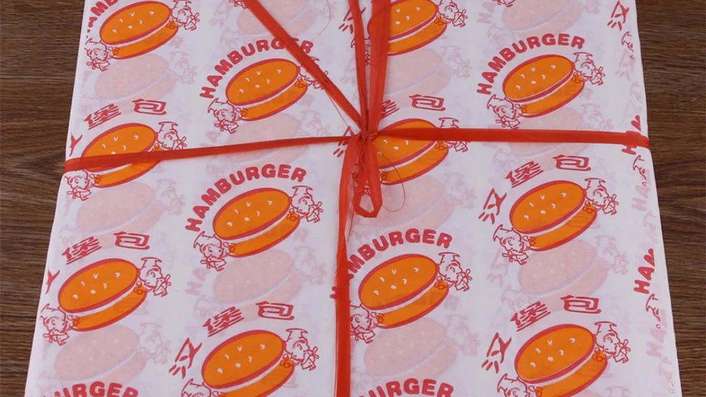 Custom printed burger wrappers and food basket liners for quick-service restaurants